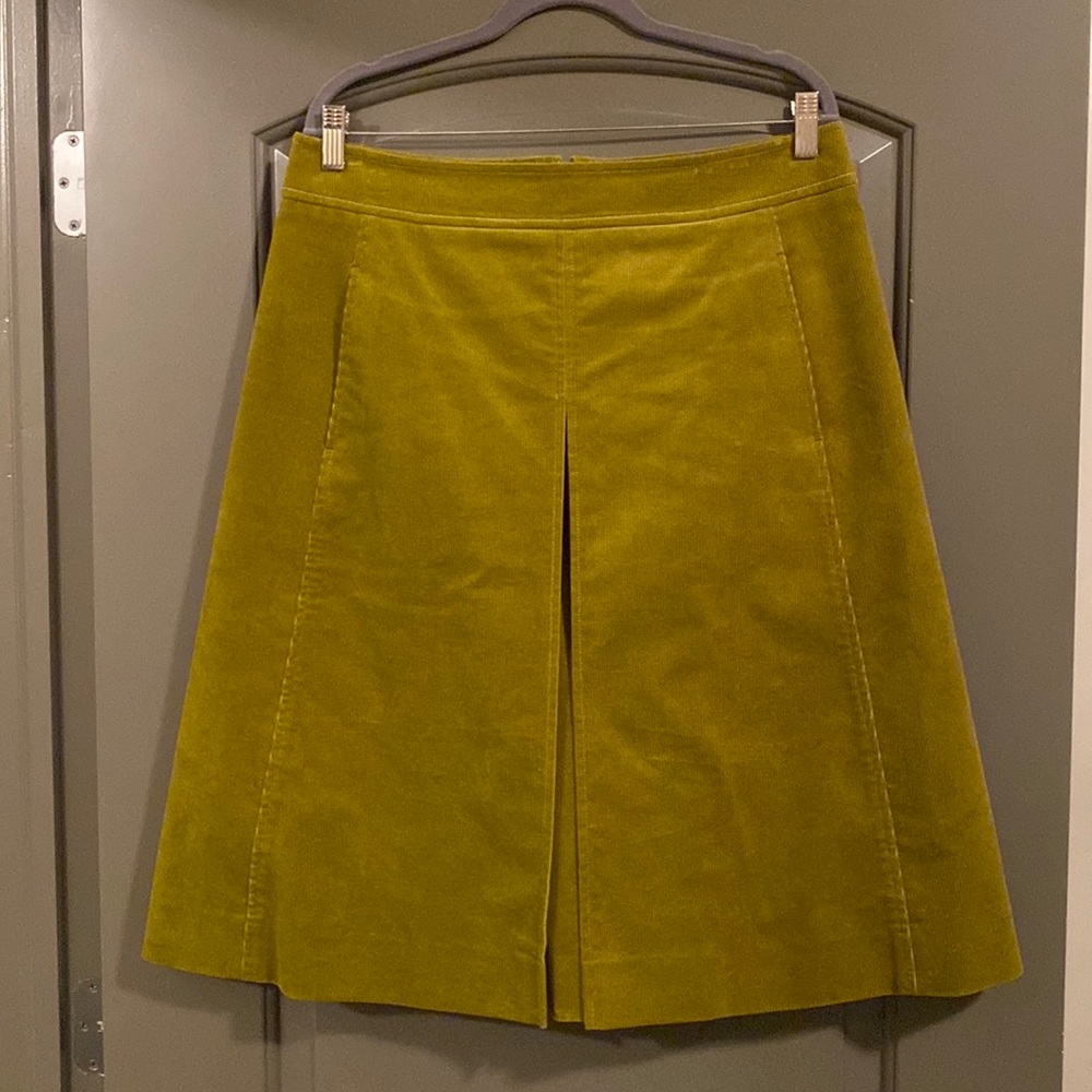 Tory Burch “Rowan skirt.” Olive green corduroy skirt with tags attached.